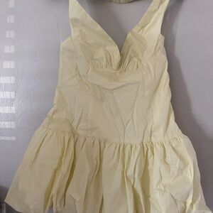 Light Yellow Sleeveless Ruffle Hem Dress